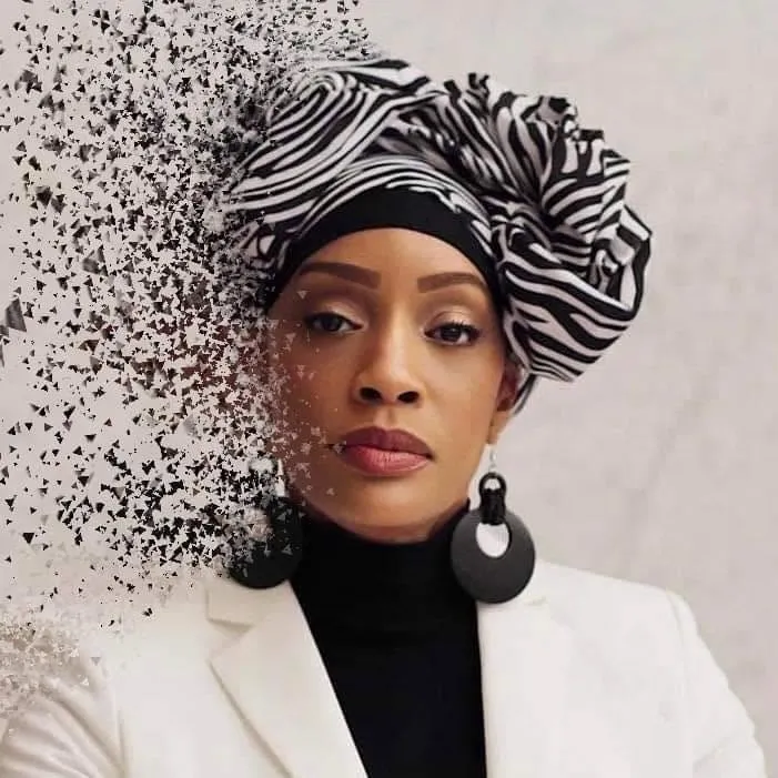 Kaleema Overton Ameen in a black-and-white headwrap and white blazer, with a dissolving effect at the left edge