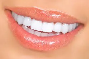 Bright healthy smile illustrating dental-care habits